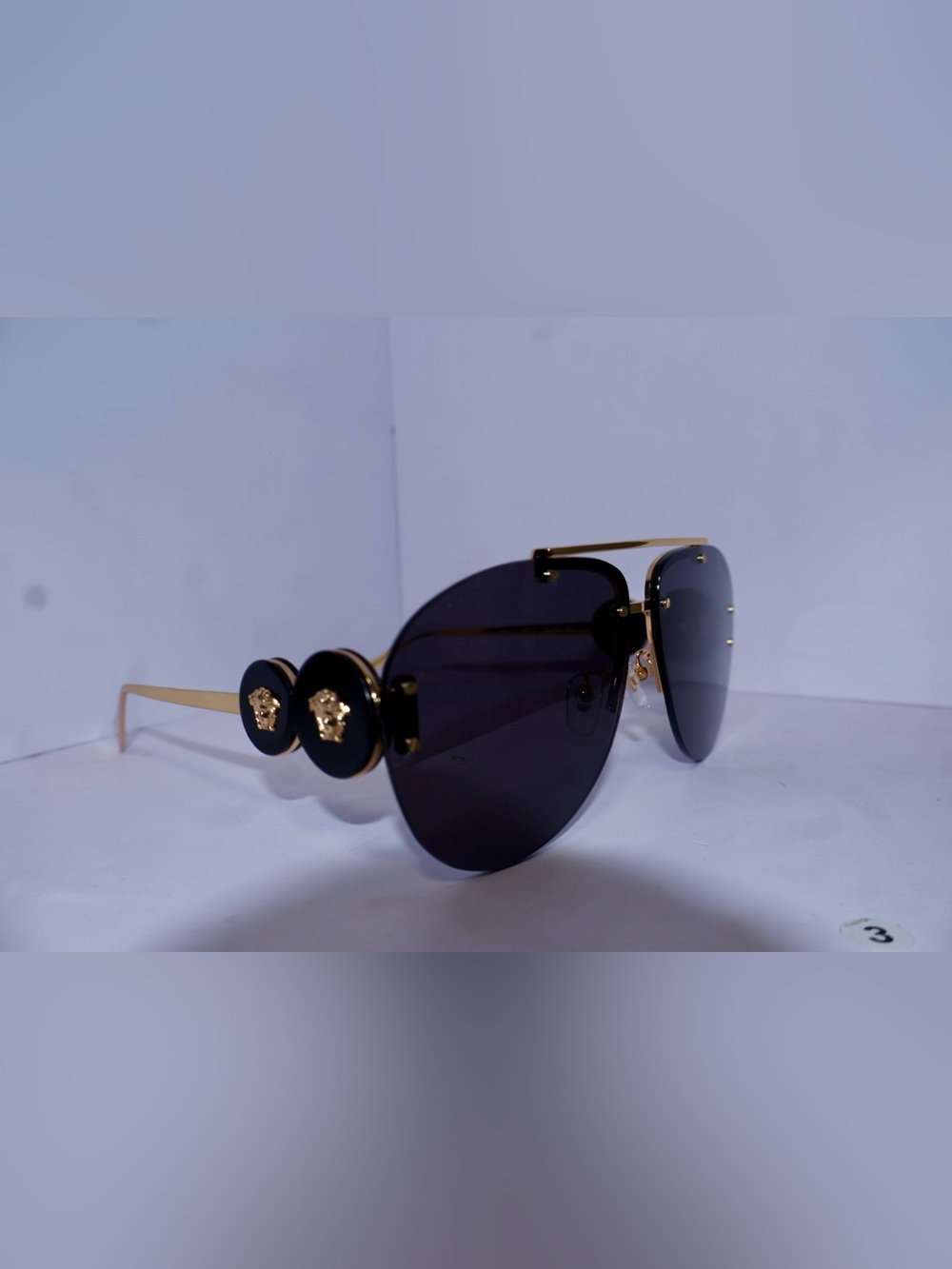 Versace Black and Gold Rimless Aviator Sunglasses
